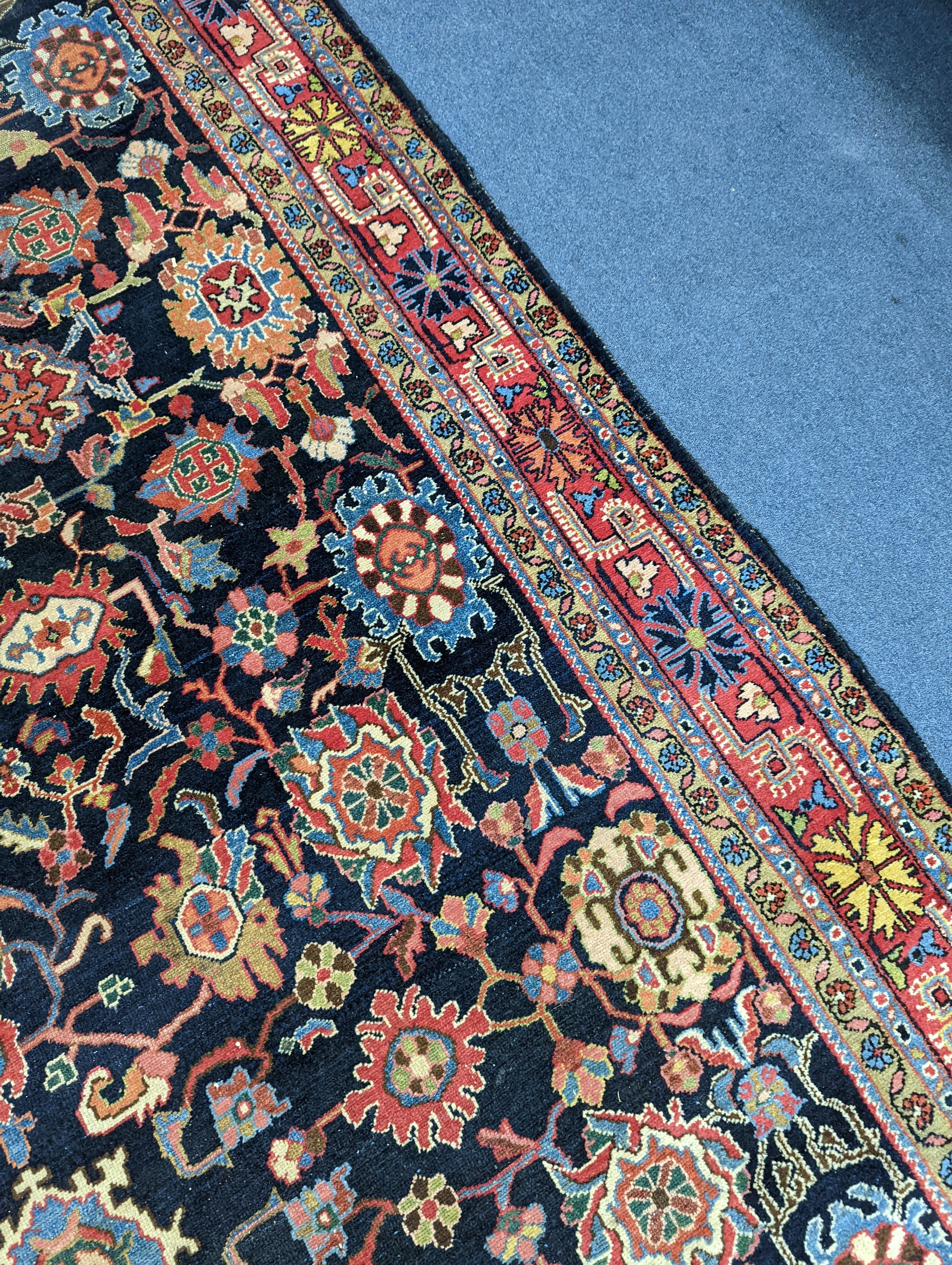 A Heriz / Moghal blue ground carpet, 340 x 206cm